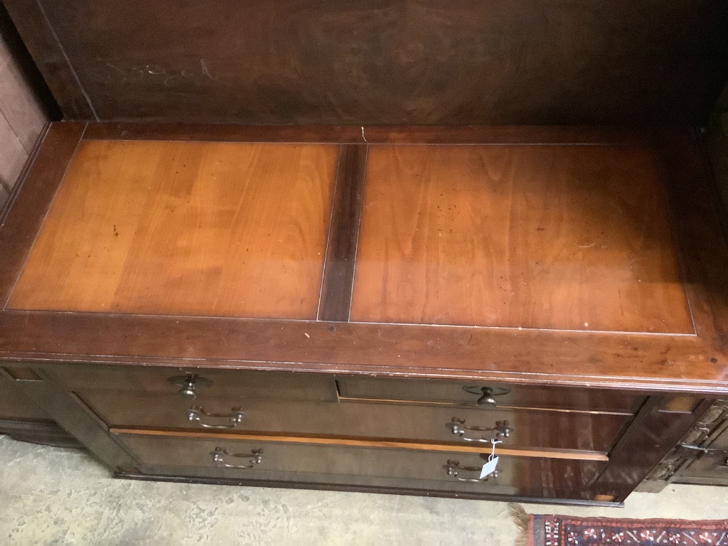 A reproduction walnut chest, width 126cm, depth 53cm, height 78cm